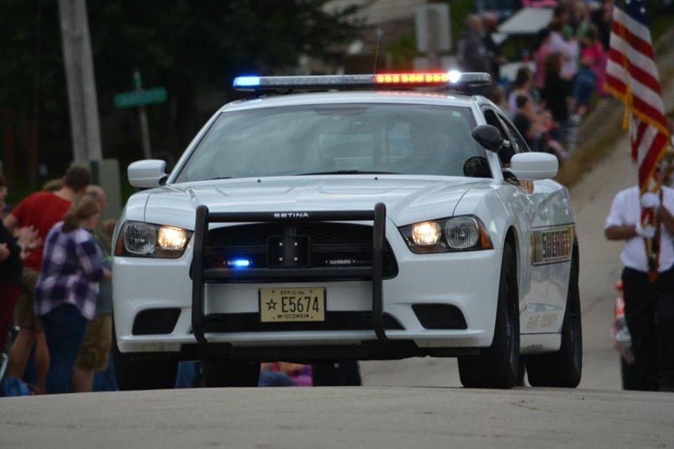 2 in car critically injured in crash when distracted driver runs milk truck through stop sign, Grant County authorities say
